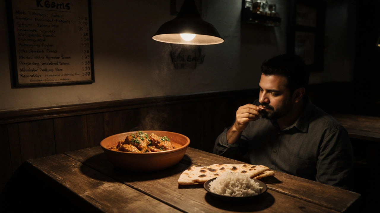Chicken karahi with garlic naan and rice in a cozy family-run restaurant